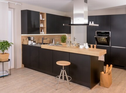 Offene Küche und trotzdem abgetrennt dank schickem Tresen Offene Küche und trotzdem abgetrennt dank schickem Tresen